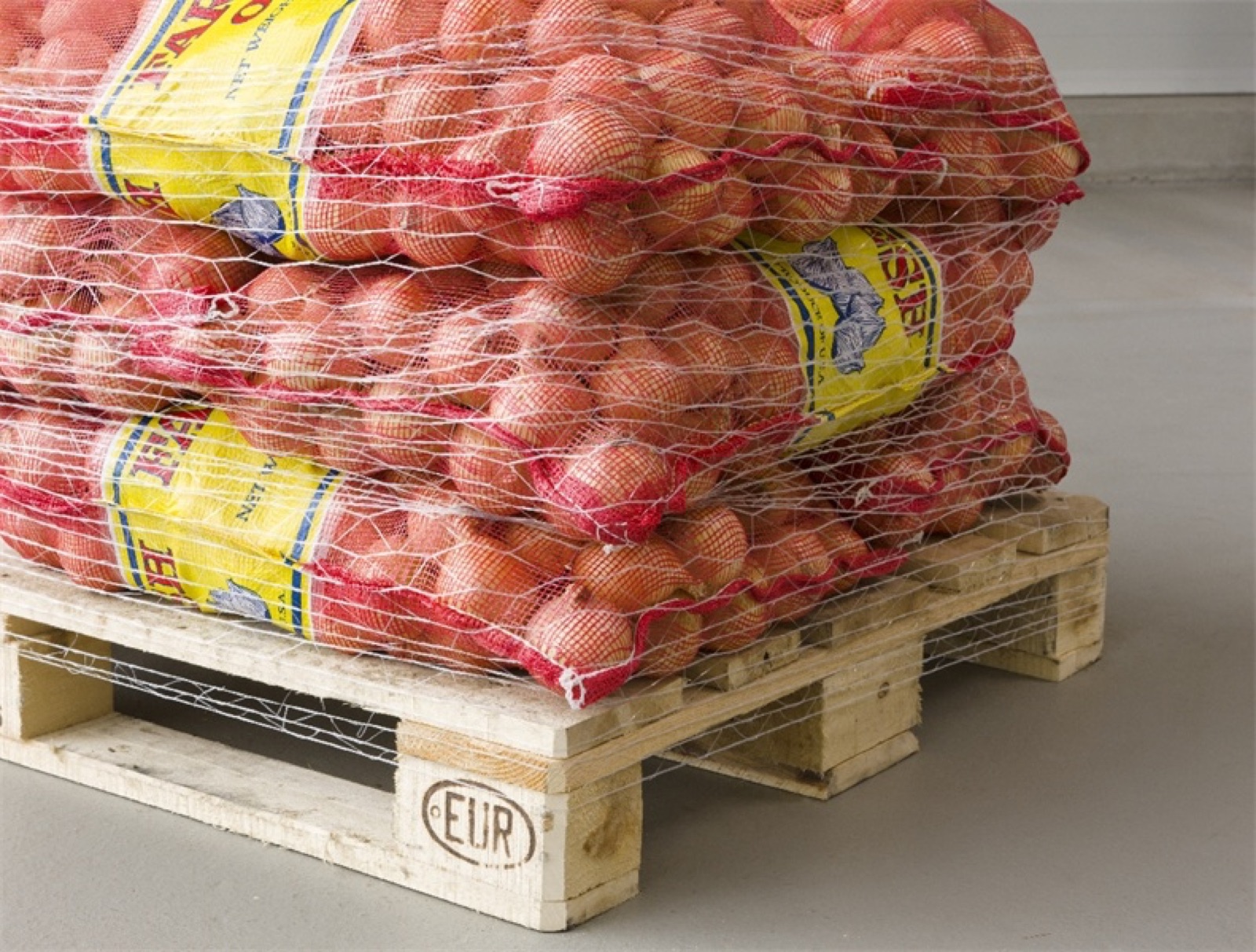 Netted bags on a EUR pallet, ready for the manifest.